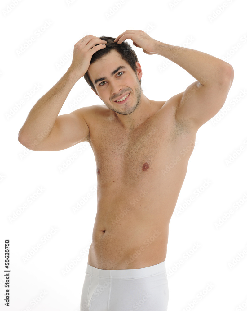 Fototapeta premium junger mann macht sich die haare