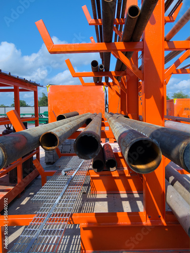 Fotografie, Obraz Industrial steel tubing pipes on a storage rack