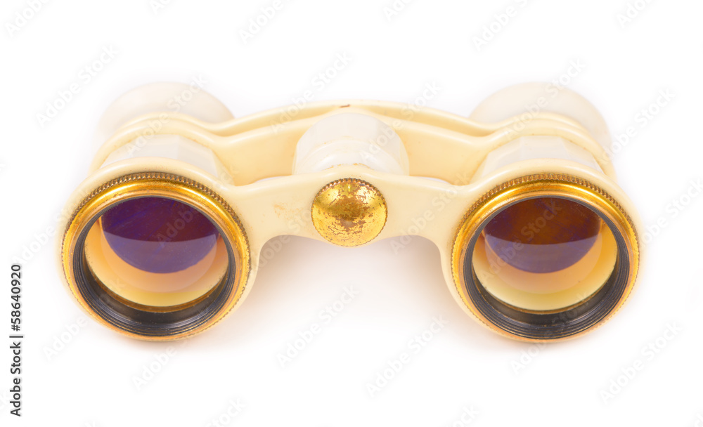 Old opera glasses isolated on white background Old opera glasses isolated on white background