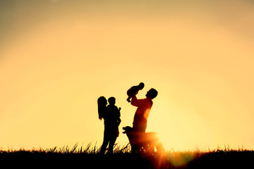 Silhouette of Happy Family and Dog