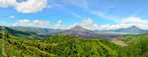 Panoramic view of Batur volcano in the sunshine day photo