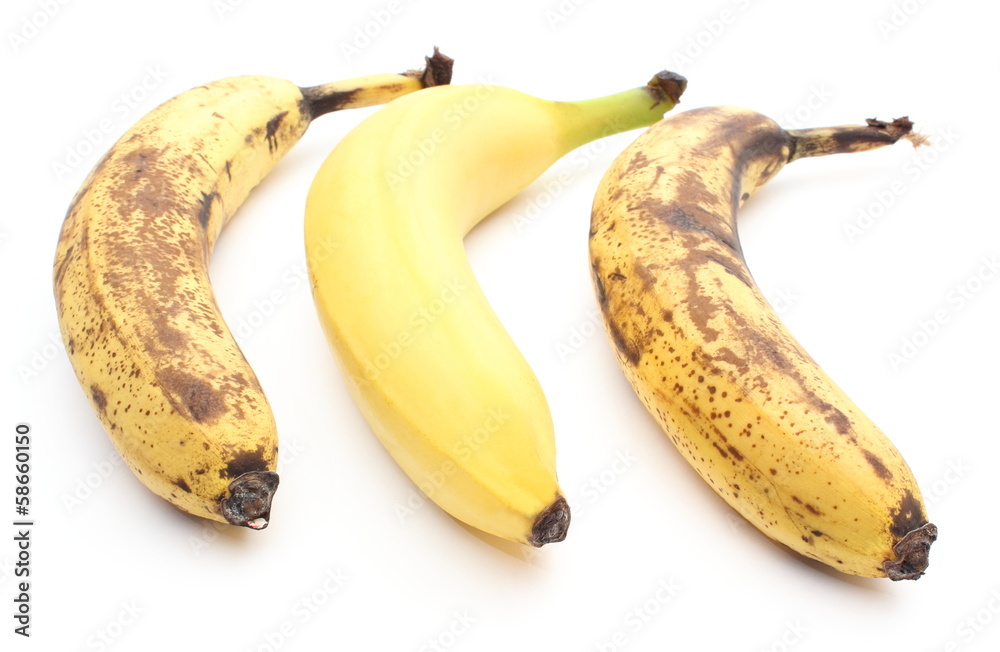 Fresh and overripe bananas on white background Fresh and overripe bananas on white background