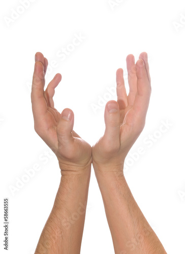 well shaped men's hand holding something isolated over white