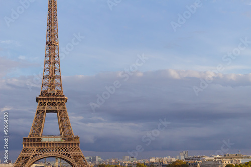 Eiffel tower on a cloudy sky