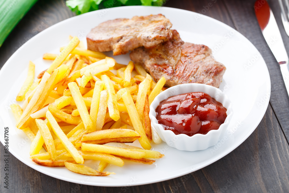Fried steak with french fries Fried steak with french fries