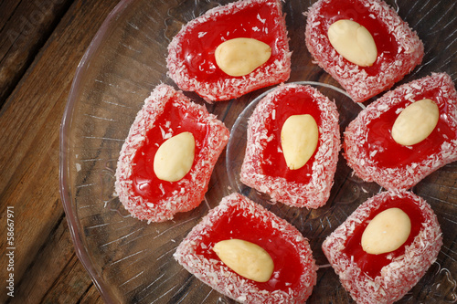 turkish delight on wooden table. ethnic food. lokum. photo