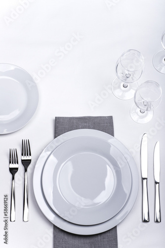 Restaurant table set for dinner