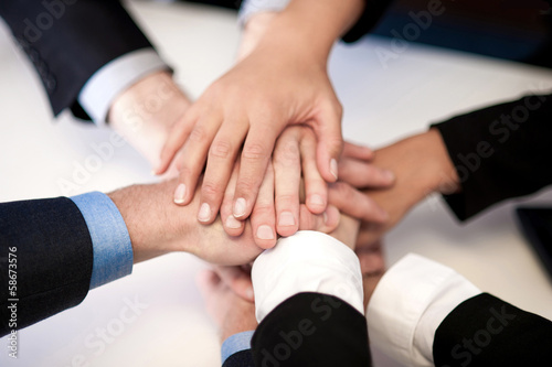 Wallpaper Mural Group of business people joining hands Torontodigital.ca