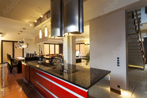 Black and red counter in kitchen