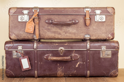 Vintage travel valises with leather name tags blanks
