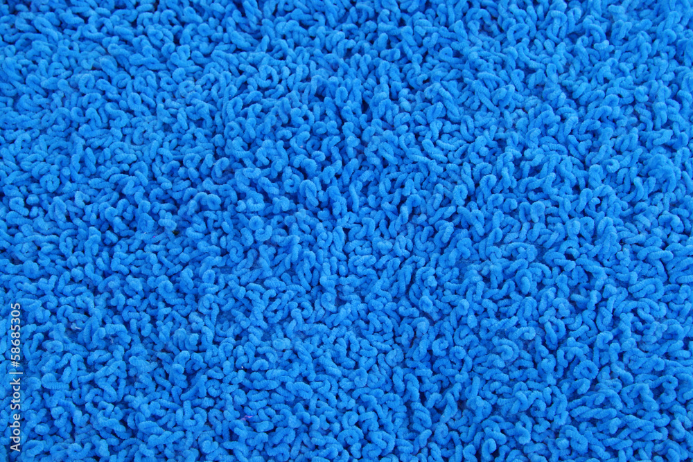 Fleecy blue pillow close-up background Fleecy blue pillow close-up background