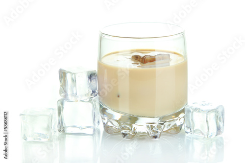 Baileys liqueur in glass isolated on white photo