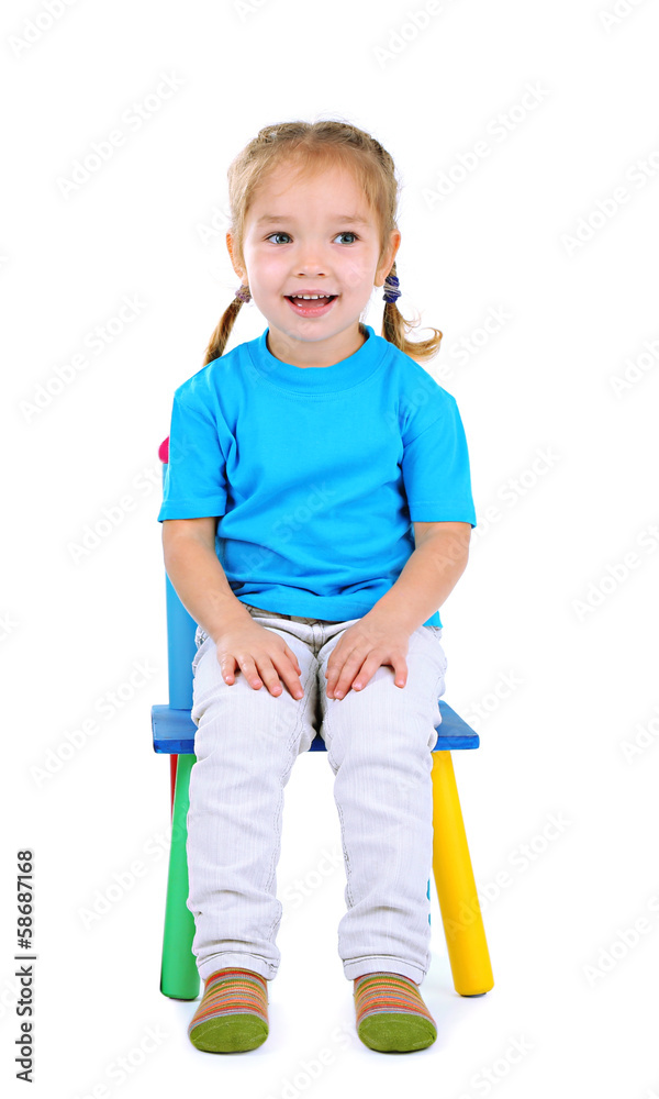 Little children playing on chairs isolated on white Little children playing on chairs isolated on white