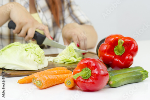 woman cutting vegetables