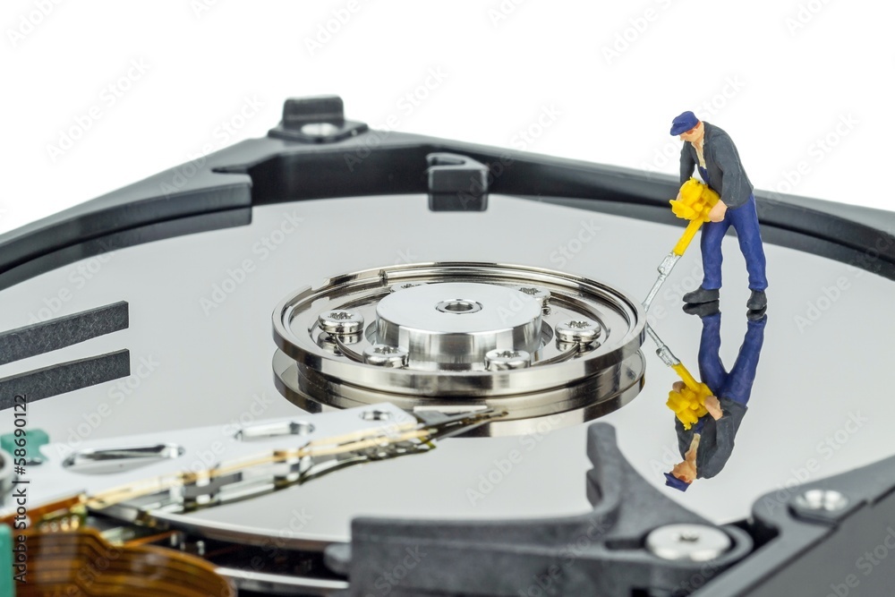 Hacking or repairing a computer hard disc drive concept Hacking or repairing a computer hard disc drive concept