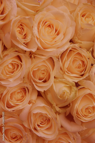 Orange rose bridal arrangement