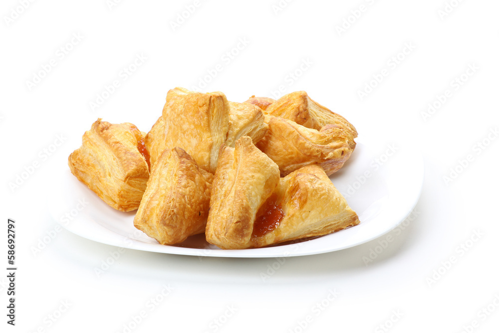 croissants on a plate, isolated