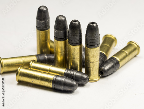 .22 caliber Long rifle Rimfire Ammunition on white photo