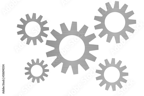 Zahnräder mit Metallstruktur auf weiß