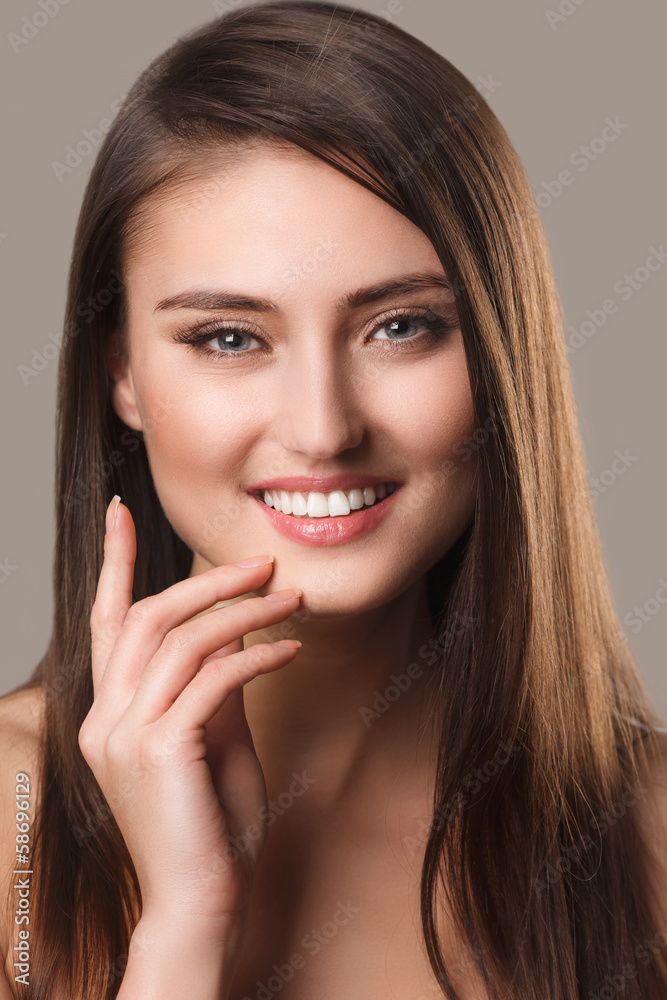 Beautiful Woman Portrait.Clear Fresh Skin.Isolated on a White Beautiful Woman Portrait.Clear Fresh Skin.Isolated on a White