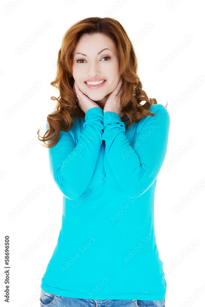 Attractive casual woman touching her neck. Attractive casual woman touching her neck.