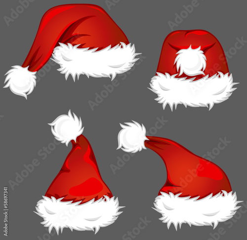 4 verschiedene Weihnachtsmützen auf dunklem Hintergrund