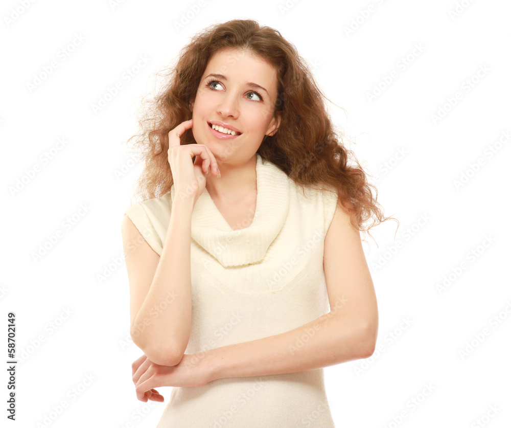 Fototapeta premium A young pensive girl looking up