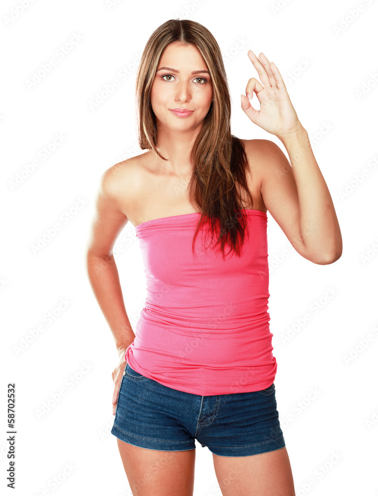 Portrait of a beautiful young woman showing ok Portrait of a beautiful young woman showing ok
