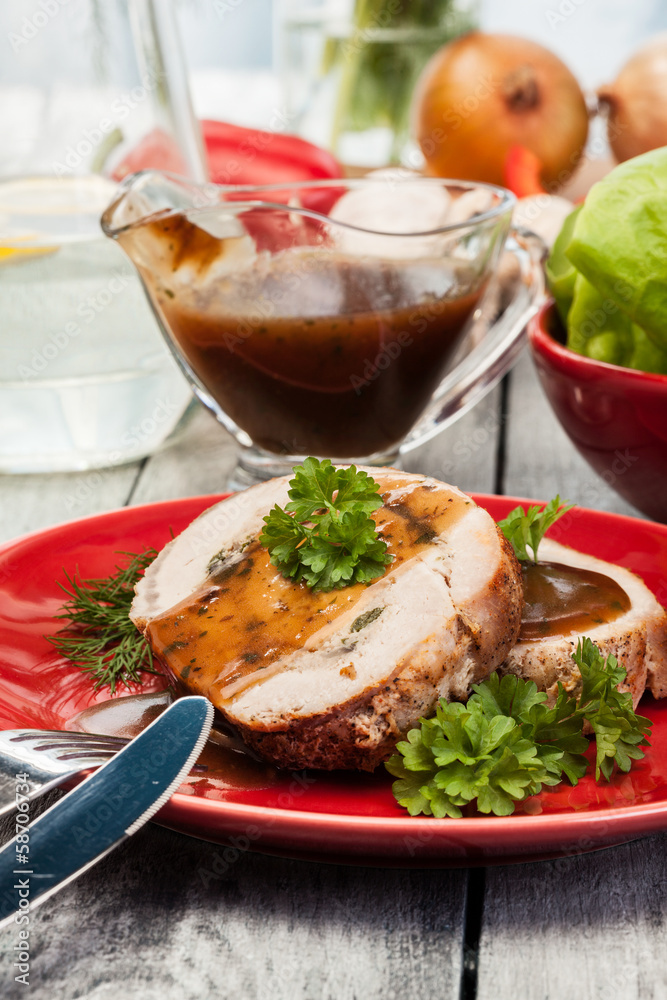 Slices of pork roast stuffed with mushrooms