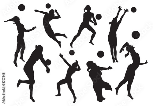 vector silhouettes of women's beach volleyball photo