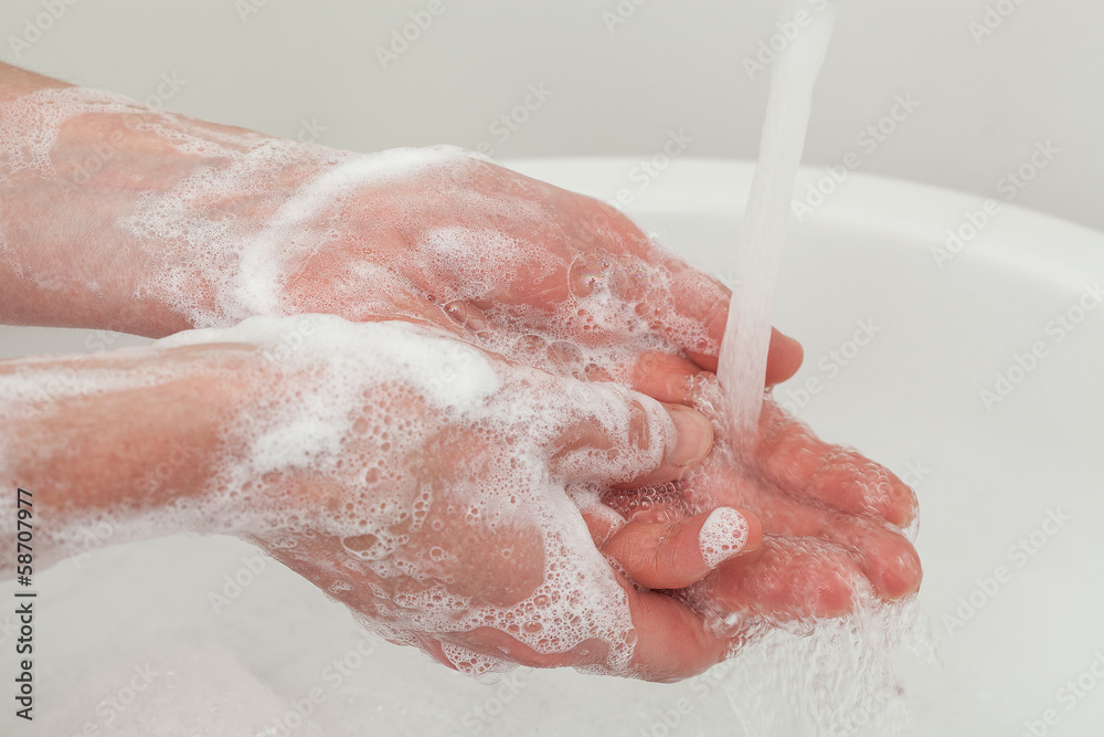 Fototapeta premium Hands rinsing