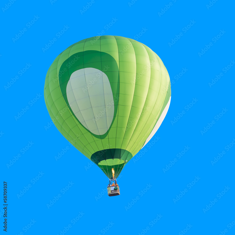 Obraz premium Colorful hot air balloon isolated on blue background