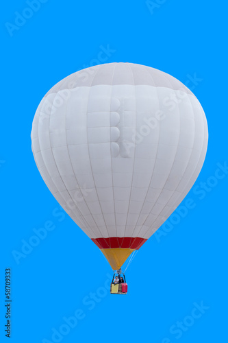 Colorful hot air balloon isolated on blue background