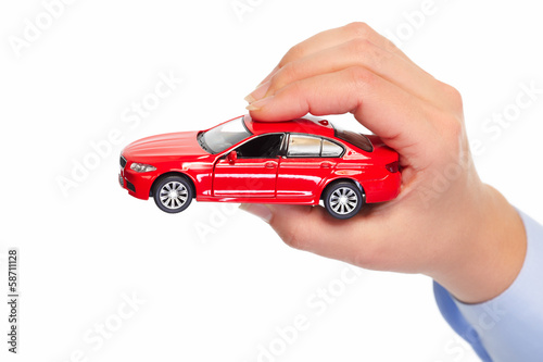 Hand with car.