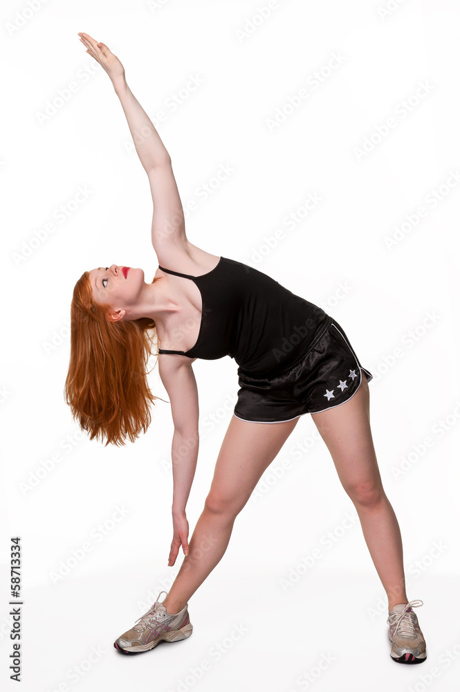 Athletic woman exercising - on white Athletic woman exercising - on white