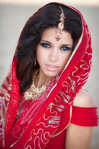 beautiful indian woman bride in red dress