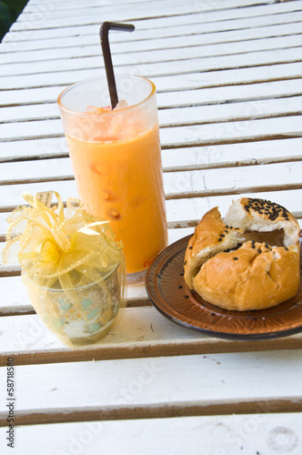 Refreshing cold frappe coffee and Chocolate bun in coffee shop