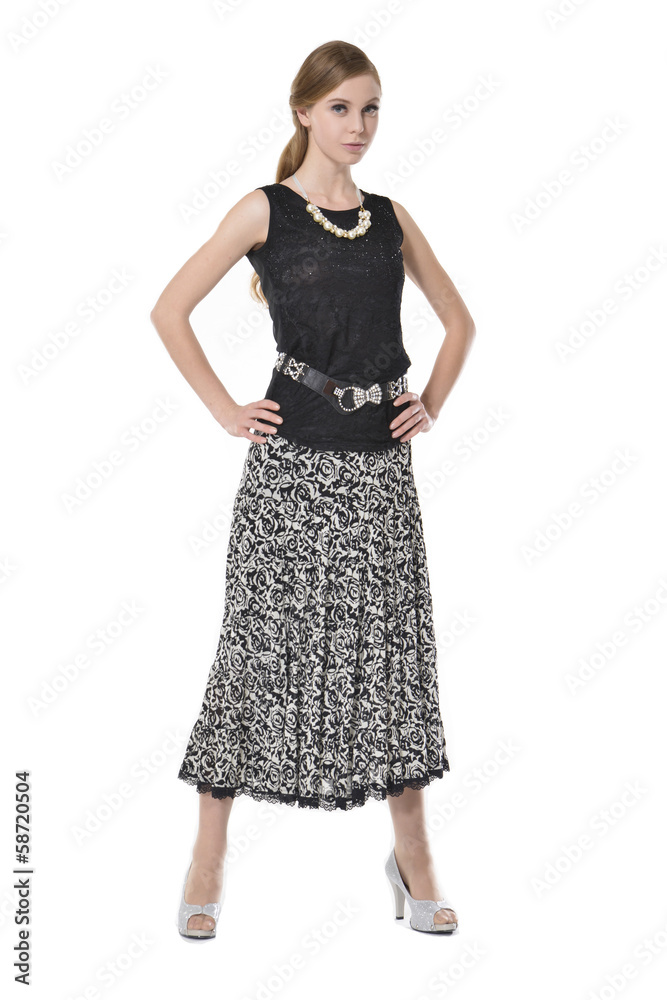 portrait of trendy young woman in elegant dress posing portrait of trendy young woman in elegant dress posing