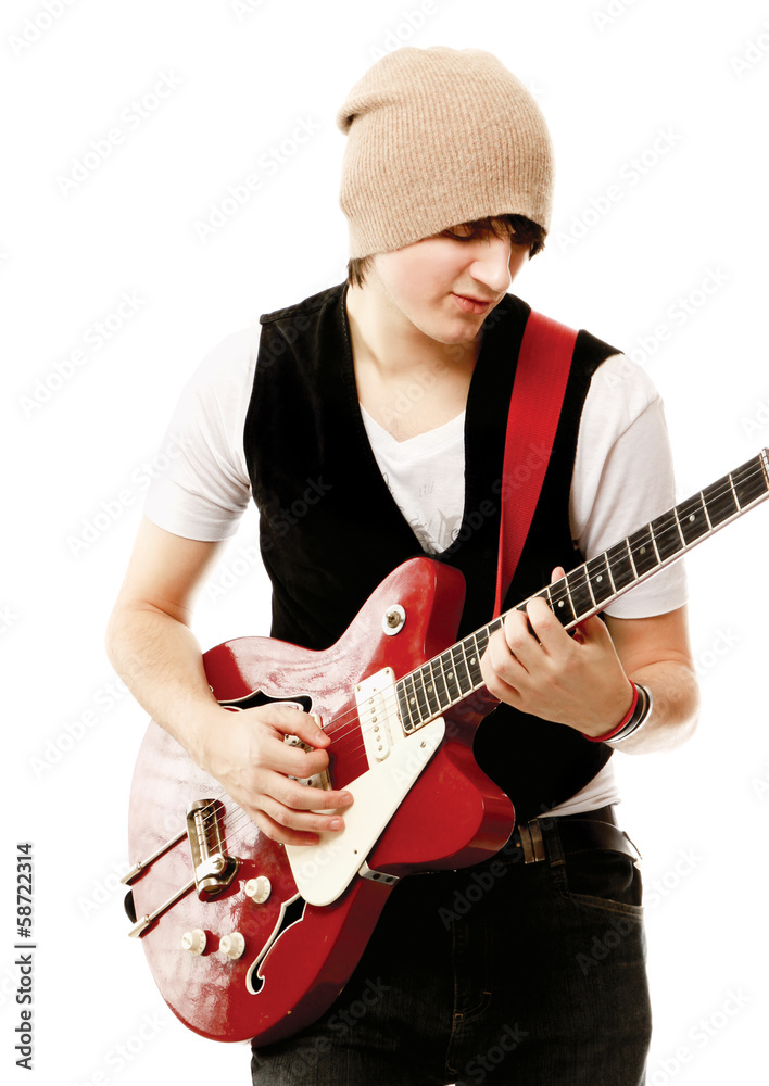 Obraz premium A portrait of a young guitarist , isolated on white background