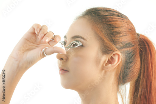 Girl making her eyelashes