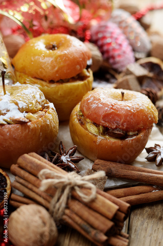 Christmas background of Homemade baked stuffed apples and spices © Dmytro_Mykhailov