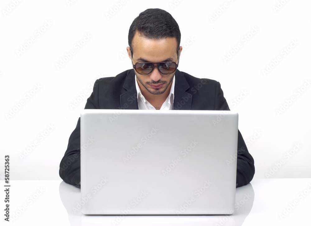 Professional hacker working on laptop Professional hacker working on laptop