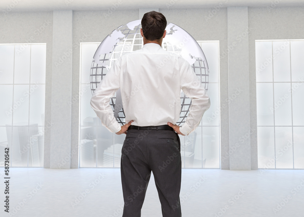 Composite image of rear view of classy young businessman posing Composite image of rear view of classy young businessman posing