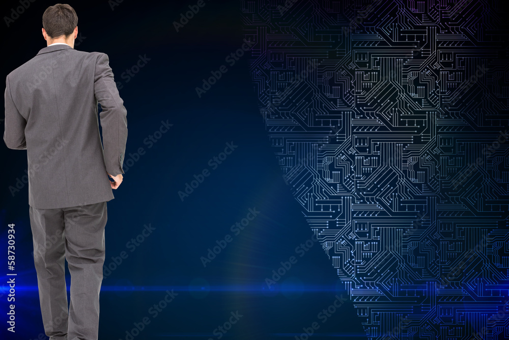 Composite image of young businessman walking away from camera Composite image of young businessman walking away from camera
