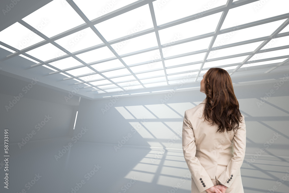 Composite image of rear view of businesswoman Composite image of rear view of businesswoman
