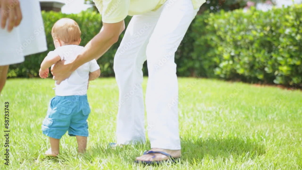 Little Caucasian Boy Toddler Barefoot Outdoors Grass Little Caucasian Boy Toddler Barefoot Outdoors Grass
