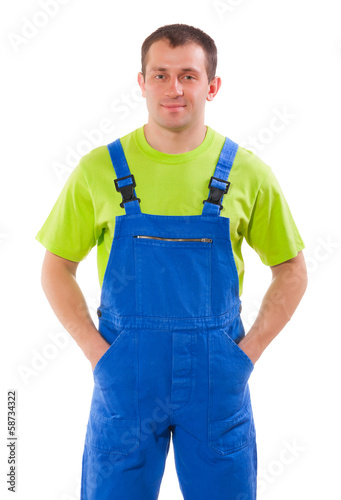 worker holding hands in pockets