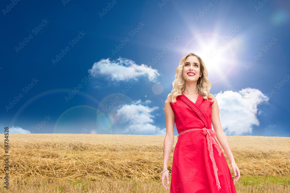 Composite image of smiling blonde walking Composite image of smiling blonde walking