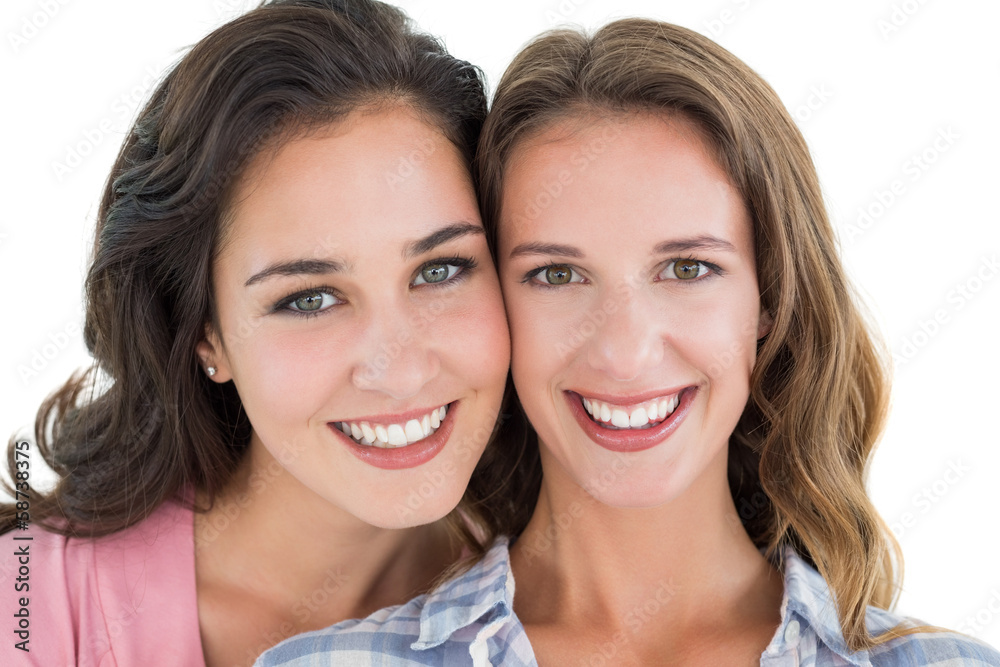 Close-up portrait of beautiful young female friends Close-up portrait of beautiful young female friends