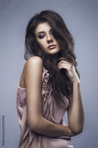 Beautiful woman and evening make-up.
